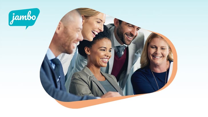 A group of people sitting around a table responsible for stakeholder management